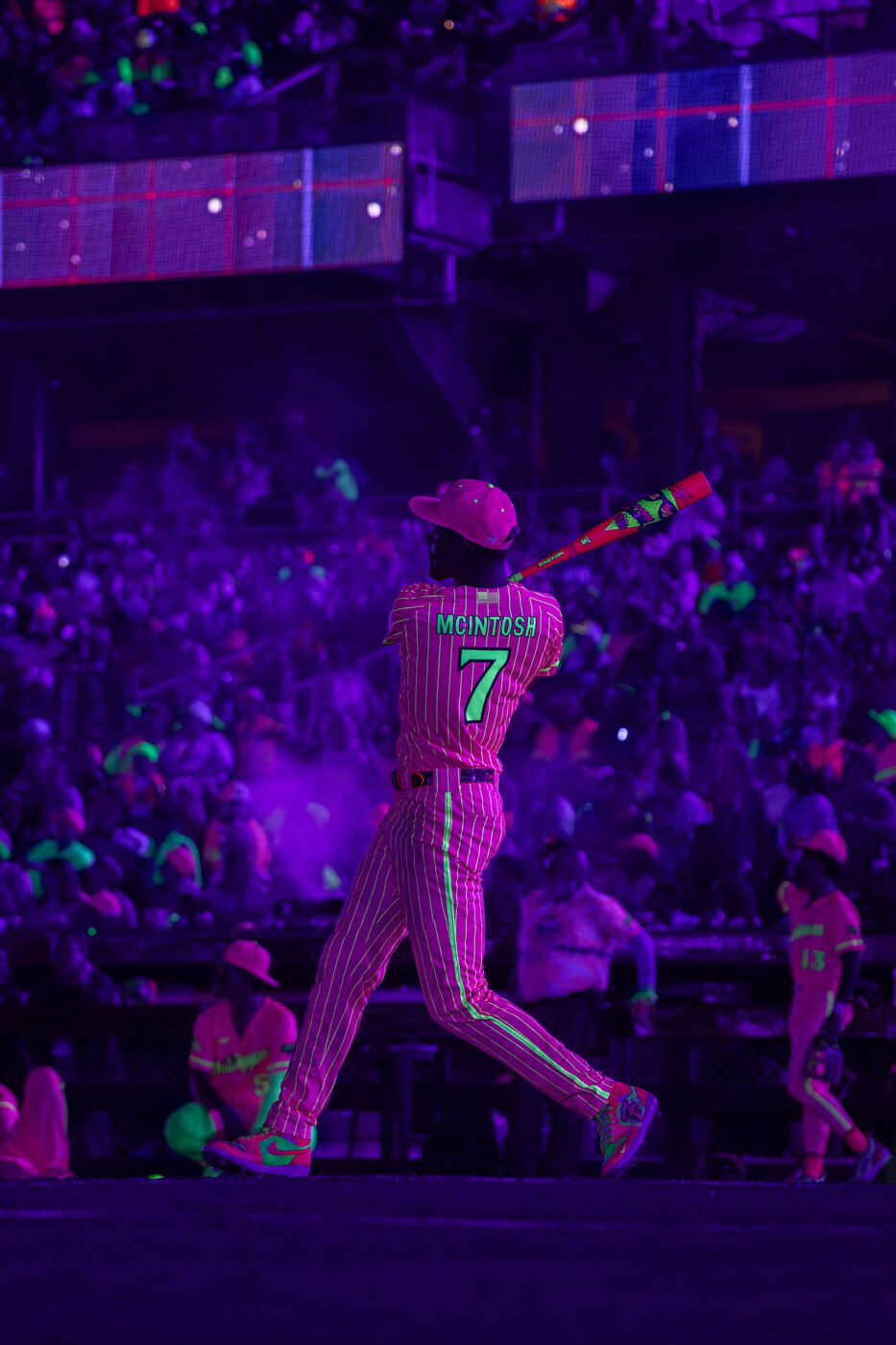 Blaine McIntosh batting under UV lights, Cosmic Baseball